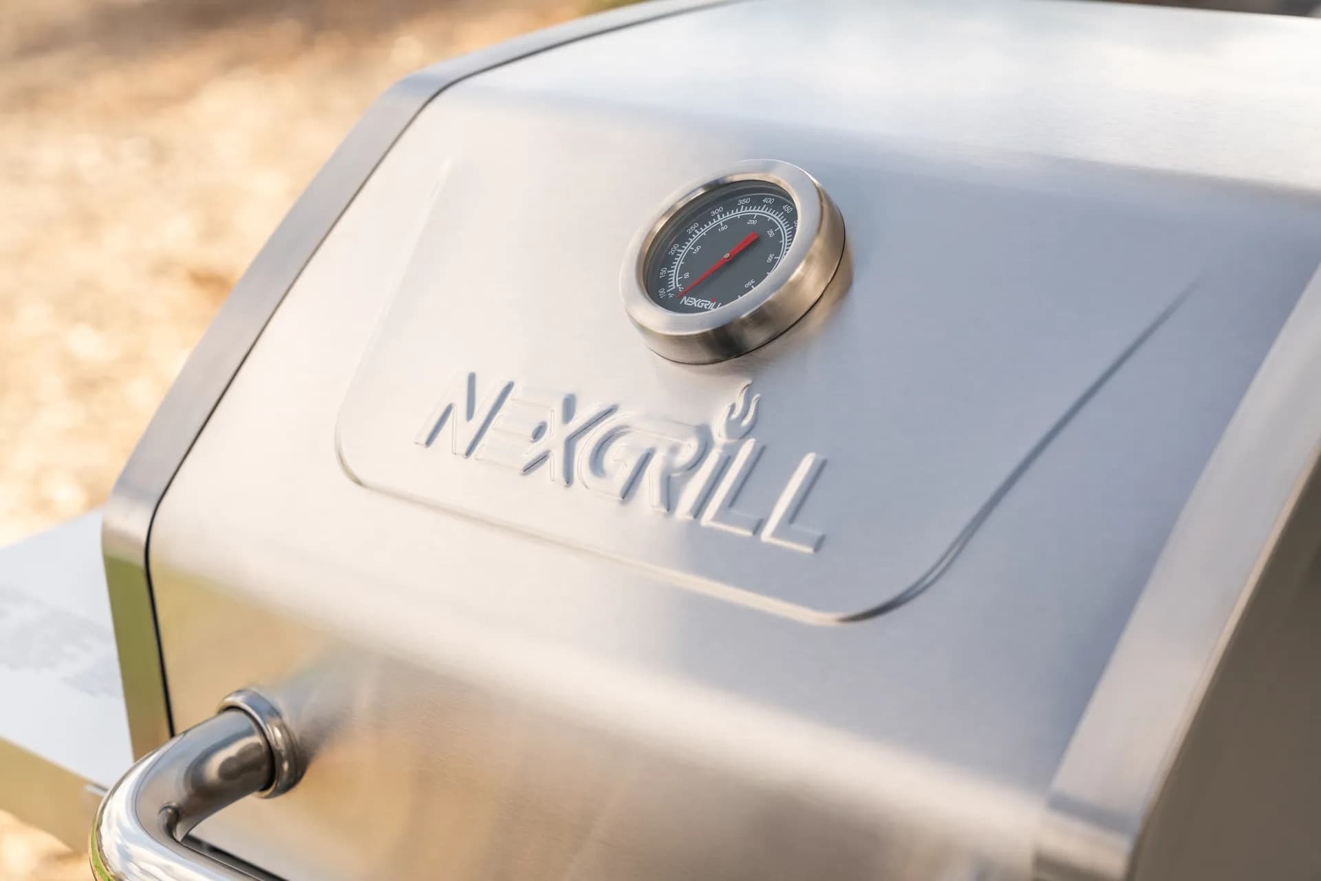 Nexgrill stainless steel grill lid with built-in analog temperature gauge