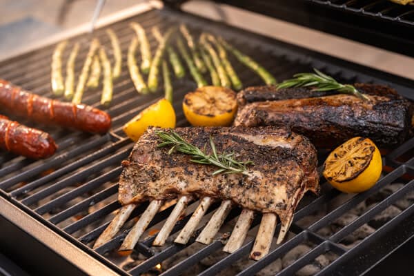 Herb-Crusted Rack of Lamb with Grilled Asparagus and Sausage