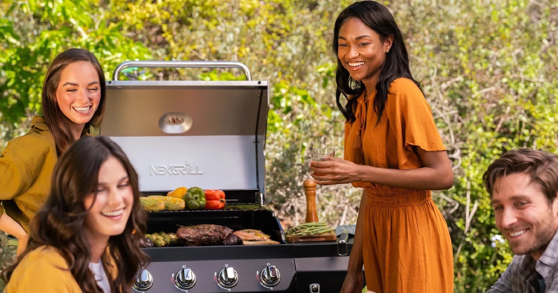 Nexgrill 4-Burner Propane Gas Grill in Black with Stainless Steal main lid