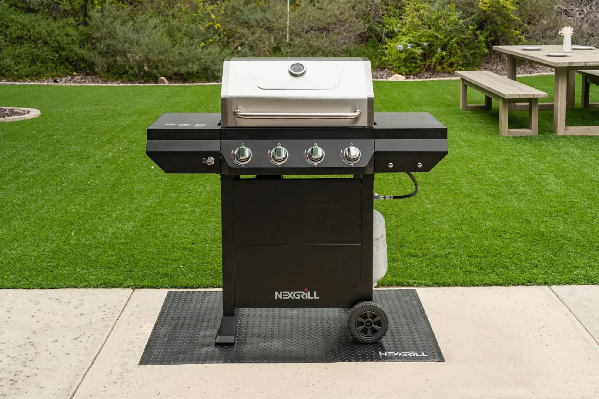 Nexgrill 4-Burner Propane Gas Grill in Black with Stainless Steal main lid